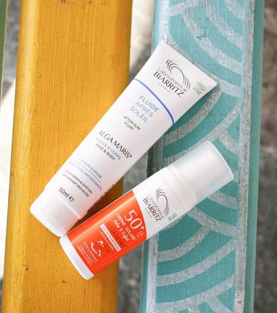Image du fluide après-soleil et de la crème solaire SPF 50